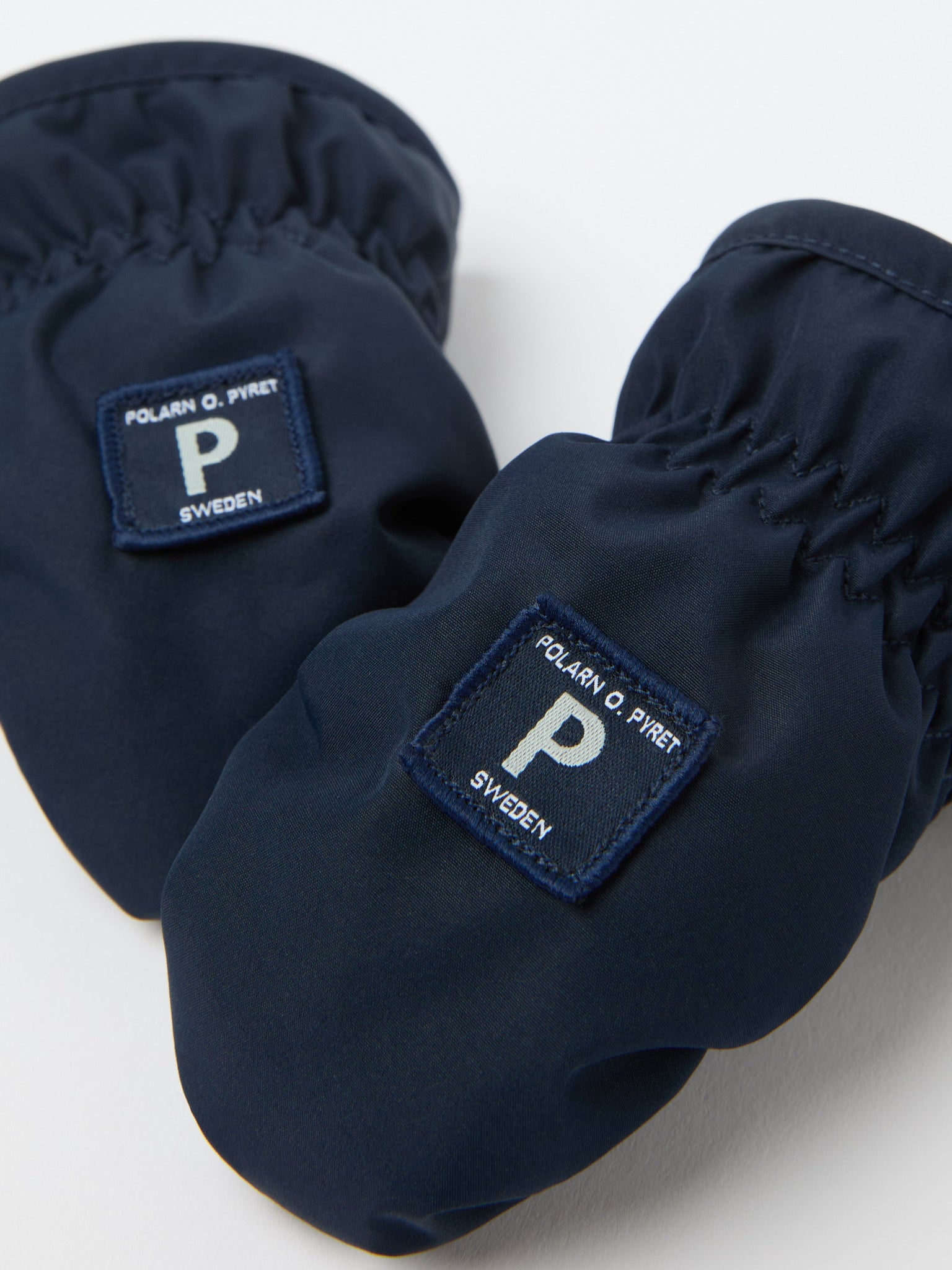 Shell Fleece Lined Baby Mittens from the Polarn O. Pyret kidswear collection. The best ethical kids outerwear.