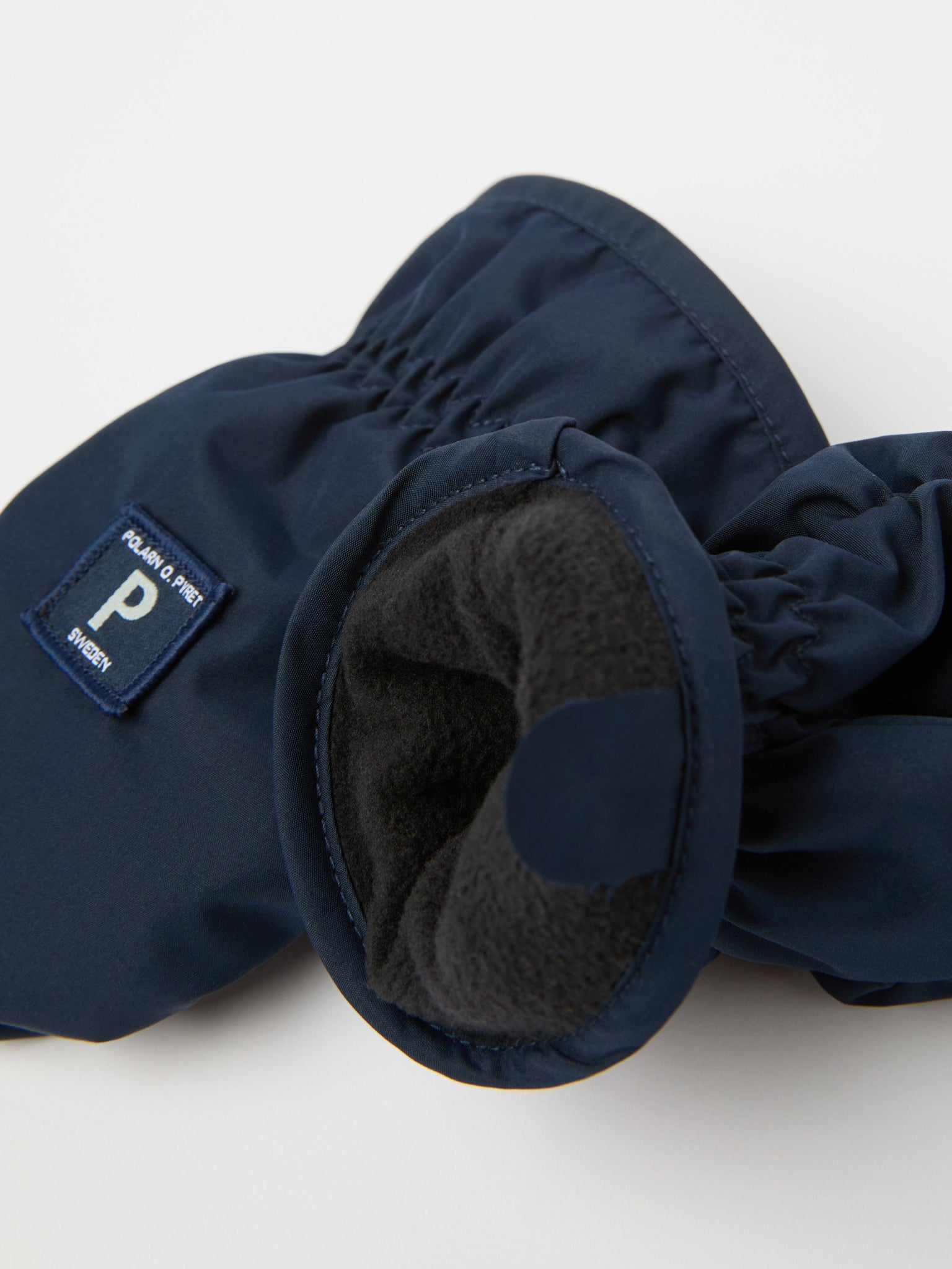 Shell Fleece Lined Baby Mittens from the Polarn O. Pyret kidswear collection. The best ethical kids outerwear.