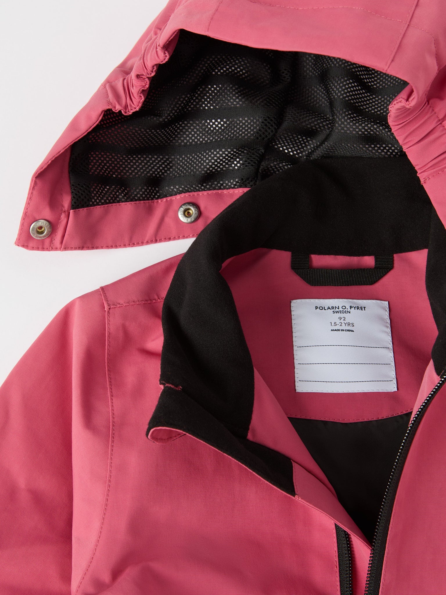 Pink Recycled Kids Puddle Suit from the Polarn O. Pyret kidswear collection. Ethically produced kids outerwear.