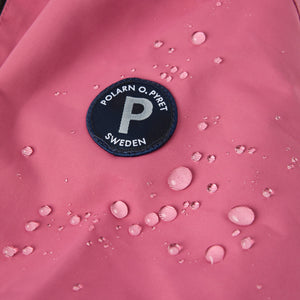 Pink Recycled Kids Puddle Suit from the Polarn O. Pyret kidswear collection. The best ethical kids outerwear.