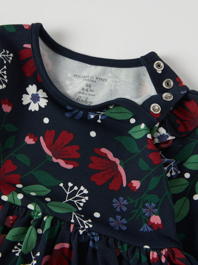 Floral Print Babygrow Dress from the Polarn O. Pyret baby collection. Clothes made using sustainably sourced materials.