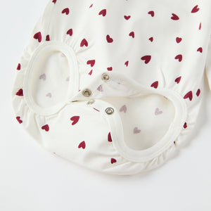 Organic Cotton Heart Print Babygrow from the Polarn O. Pyret baby collection. Ethically produced kids clothing.