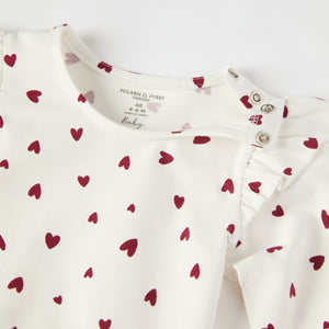 Organic Cotton Heart Print Babygrow from the Polarn O. Pyret baby collection. Ethically produced kids clothing.