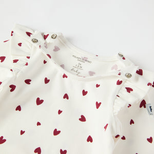 Organic Cotton Heart Print Babygrow from the Polarn O. Pyret baby collection. Ethically produced kids clothing.