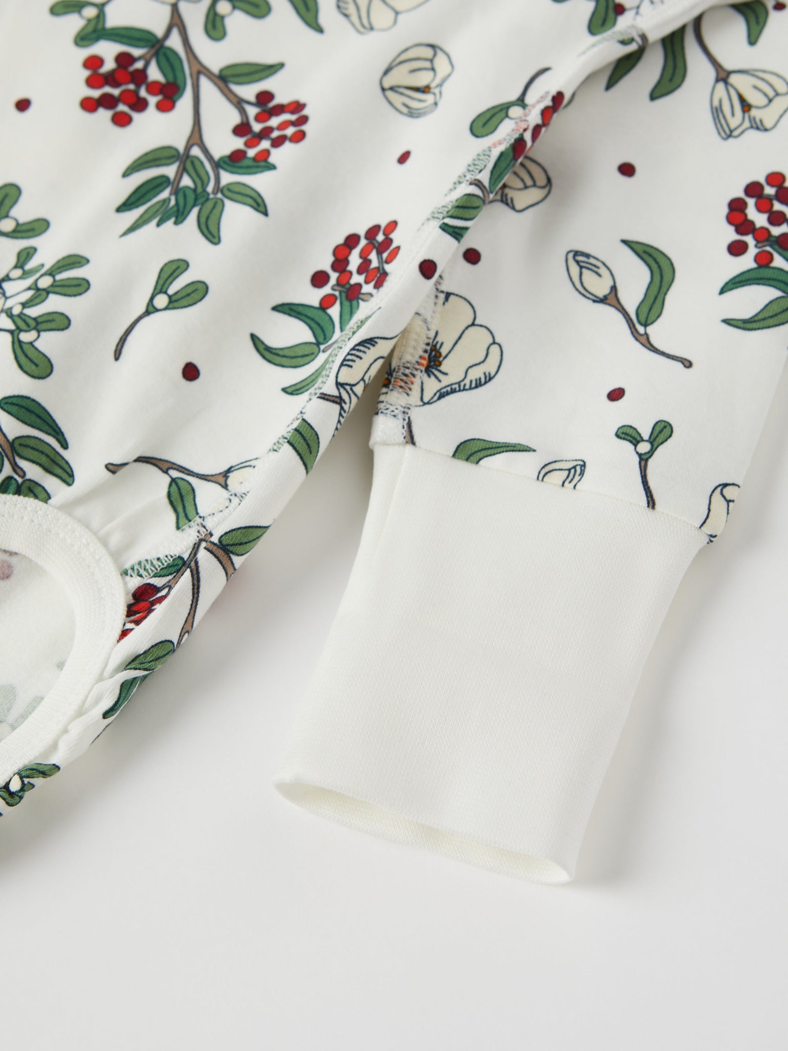 Organic Cotton Floral Print Babygrow from the Polarn O. Pyret baby collection. Nordic kids clothes made from sustainable sources.