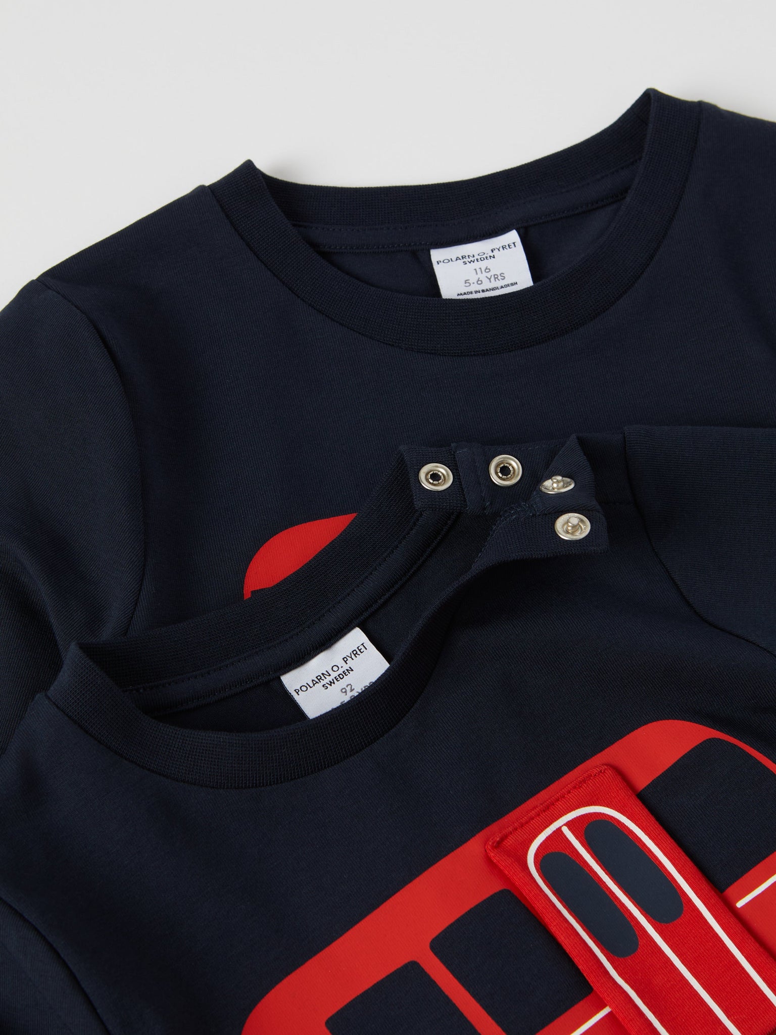 Bus Print Cotton Kids Top from the Polarn O. Pyret kidswear collection. Clothes made using sustainably sourced materials.