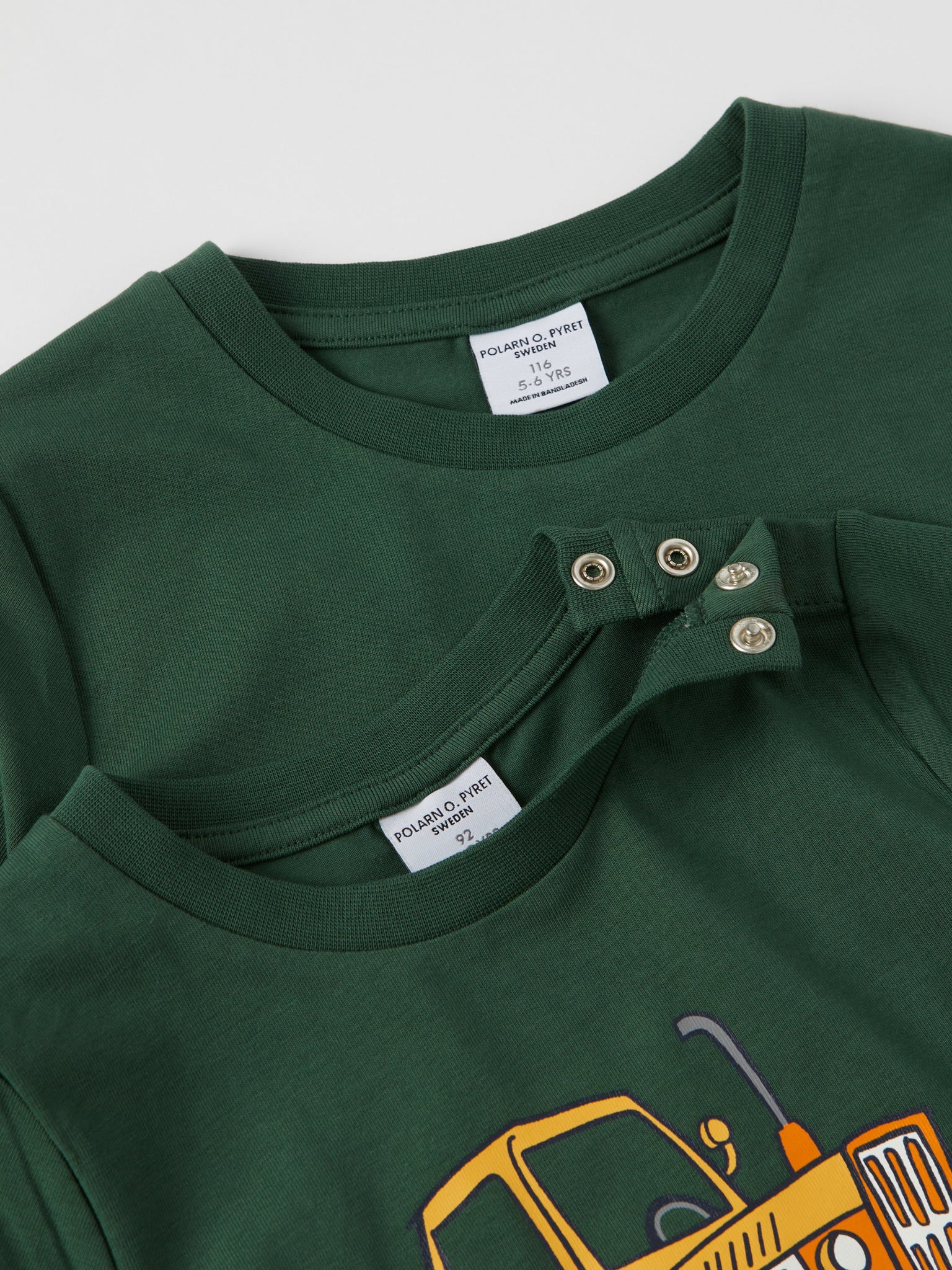 Tractor Print Cotton Kids Top from the Polarn O. Pyret kidswear collection. Nordic kids clothes made from sustainable sources.