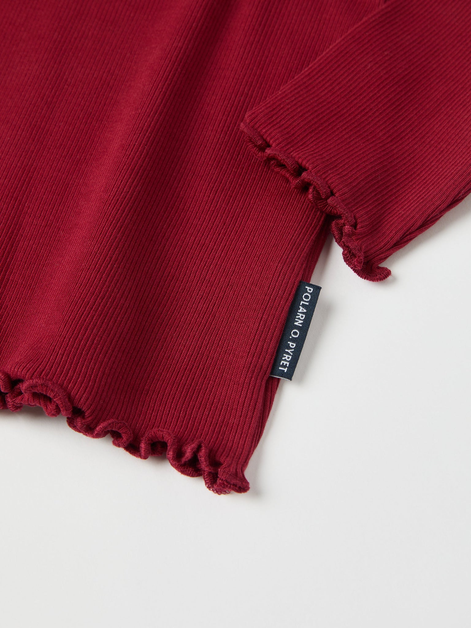 Red Ribbed Kids Top from the Polarn O. Pyret kidswear collection. Nordic kids clothes made from sustainable sources.