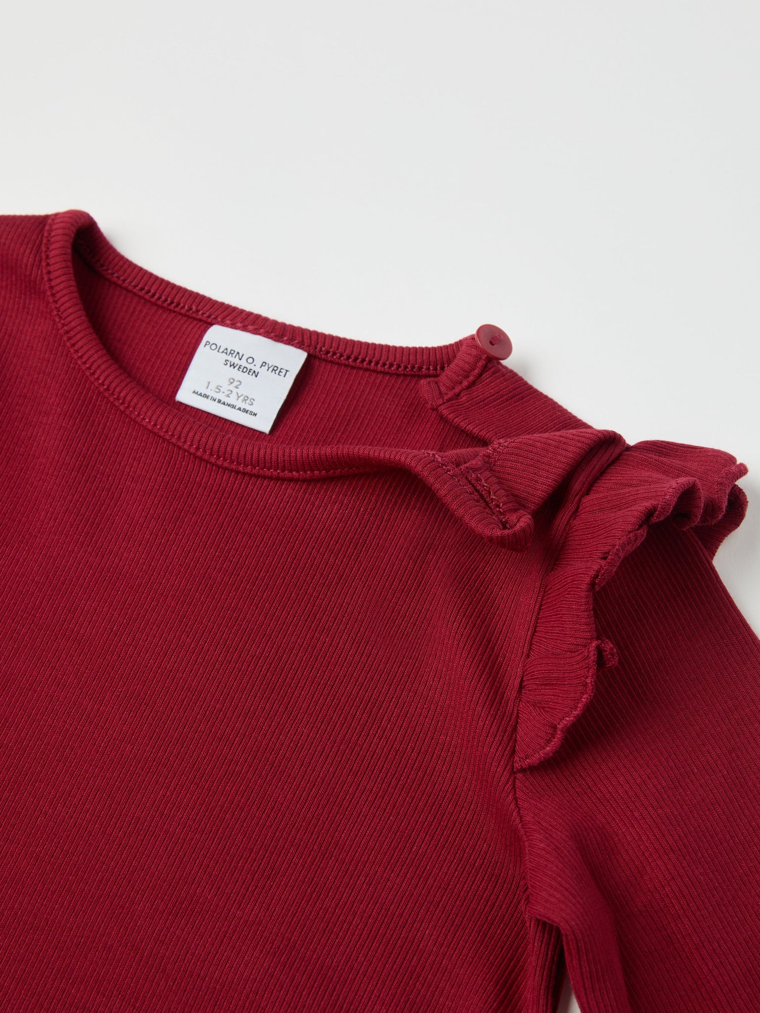 Red Ribbed Kids Top from the Polarn O. Pyret kidswear collection. Nordic kids clothes made from sustainable sources.