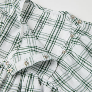 Organic Cotton Checked Baby Dress from the Polarn O. Pyret baby collection. Ethically produced kids clothing.