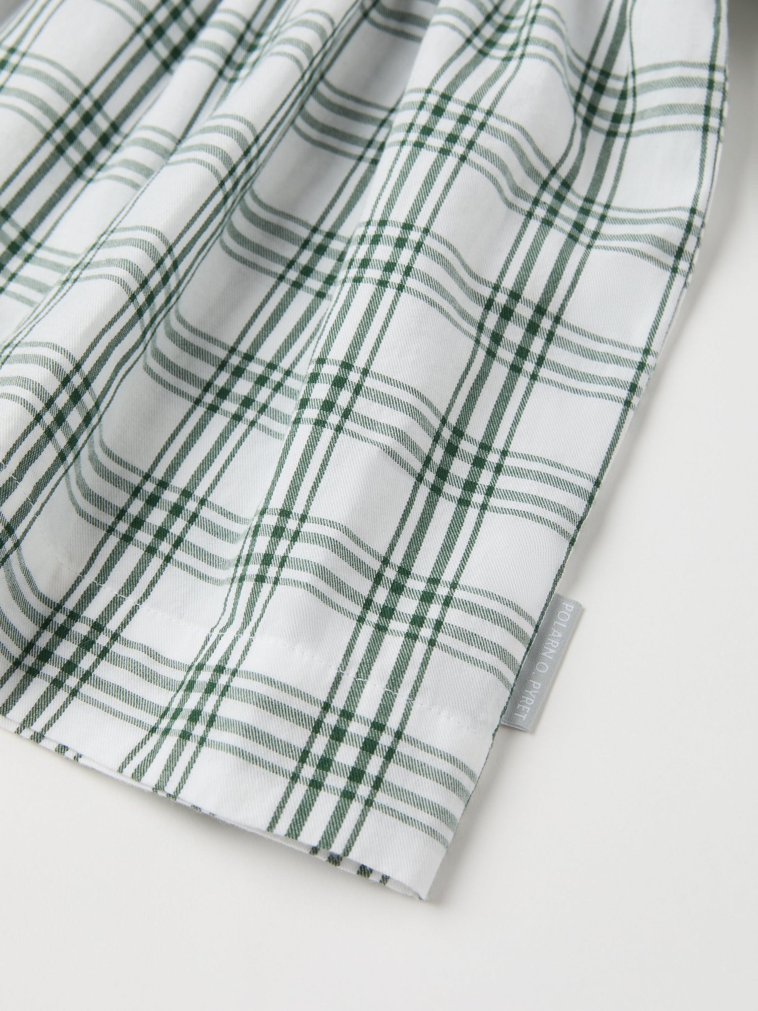 Organic Cotton Checked Baby Dress from the Polarn O. Pyret baby collection. Ethically produced kids clothing.