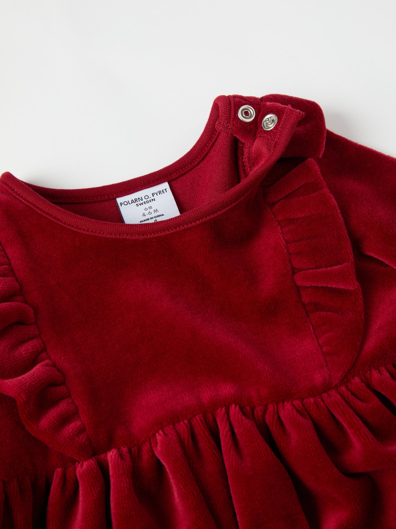 Organic Cotton Velour Dress from the Polarn O. Pyret baby collection. Clothes made using sustainably sourced materials.