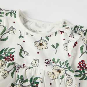 Organic Cotton Floral Print Baby Dress from the Polarn O. Pyret baby collection. Nordic kids clothes made from sustainable sources.