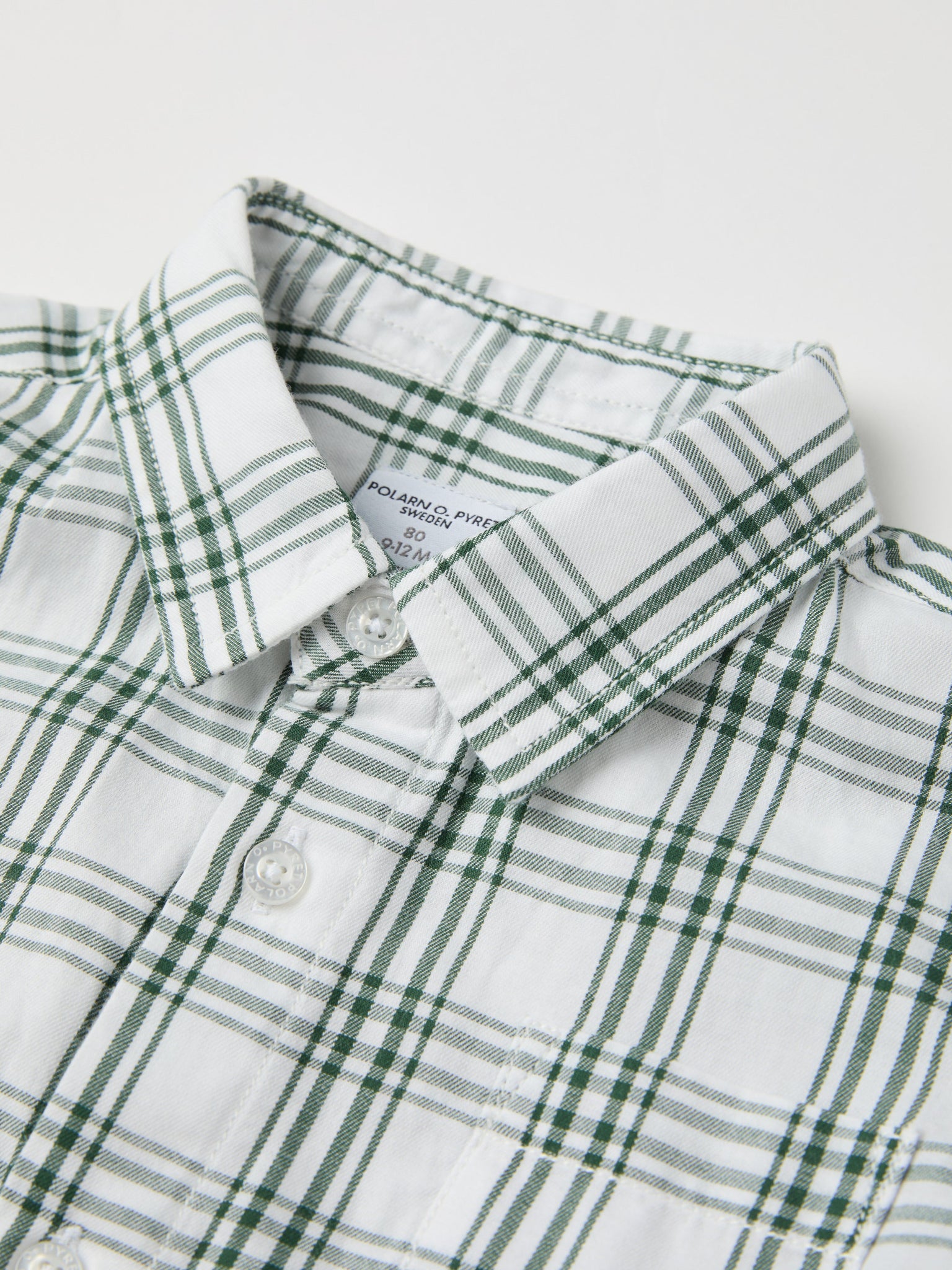 Checked Organic Cotton Baby Shirt from the Polarn O. Pyret baby collection. Nordic kids clothes made from sustainable sources.