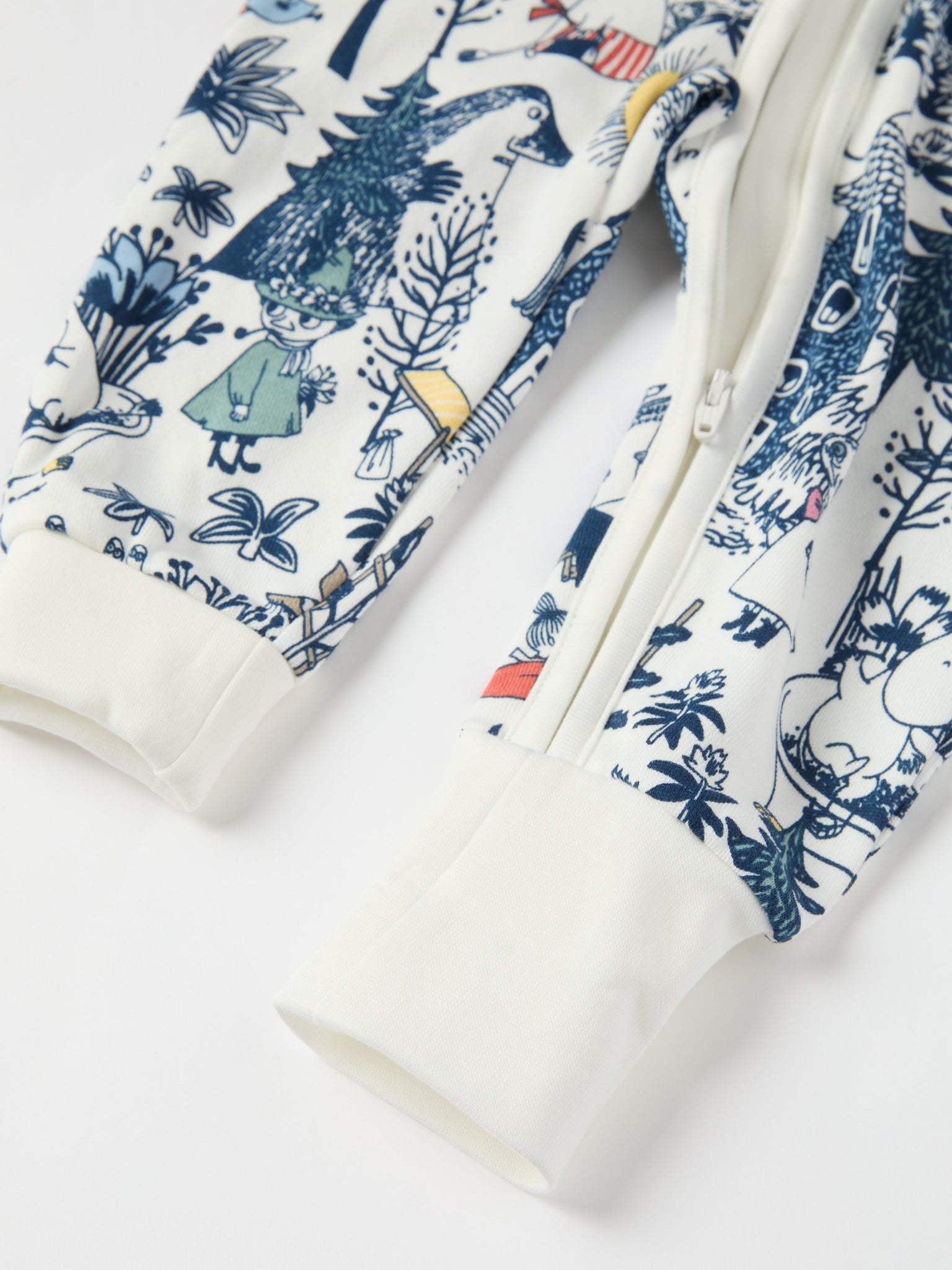 Moomin Print Baby All-in-one from the Polarn O. Pyret baby collection. Clothes made using sustainably sourced materials.