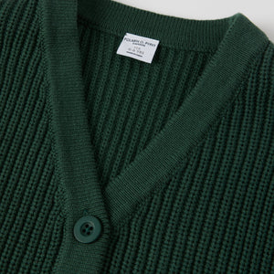 Green Ribbed Kids Cardigan from the Polarn O. Pyret kidswear collection. Clothes made using sustainably sourced materials.