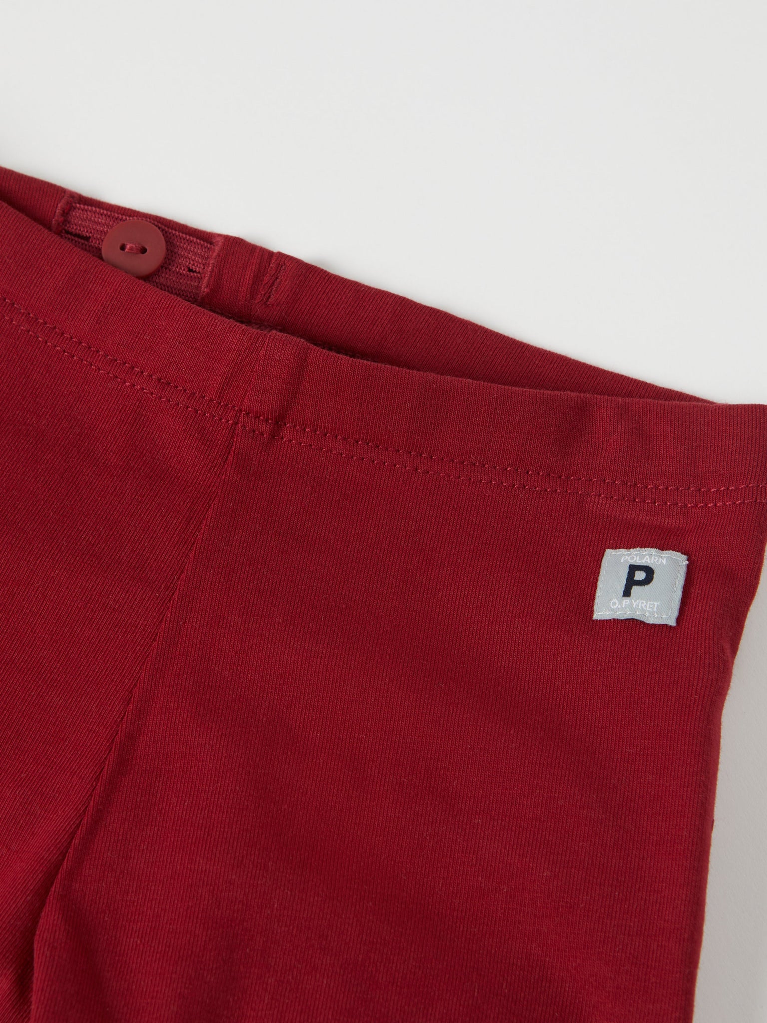 Red Ruffled Baby Leggings from the Polarn O. Pyret baby collection. Clothes made using sustainably sourced materials.