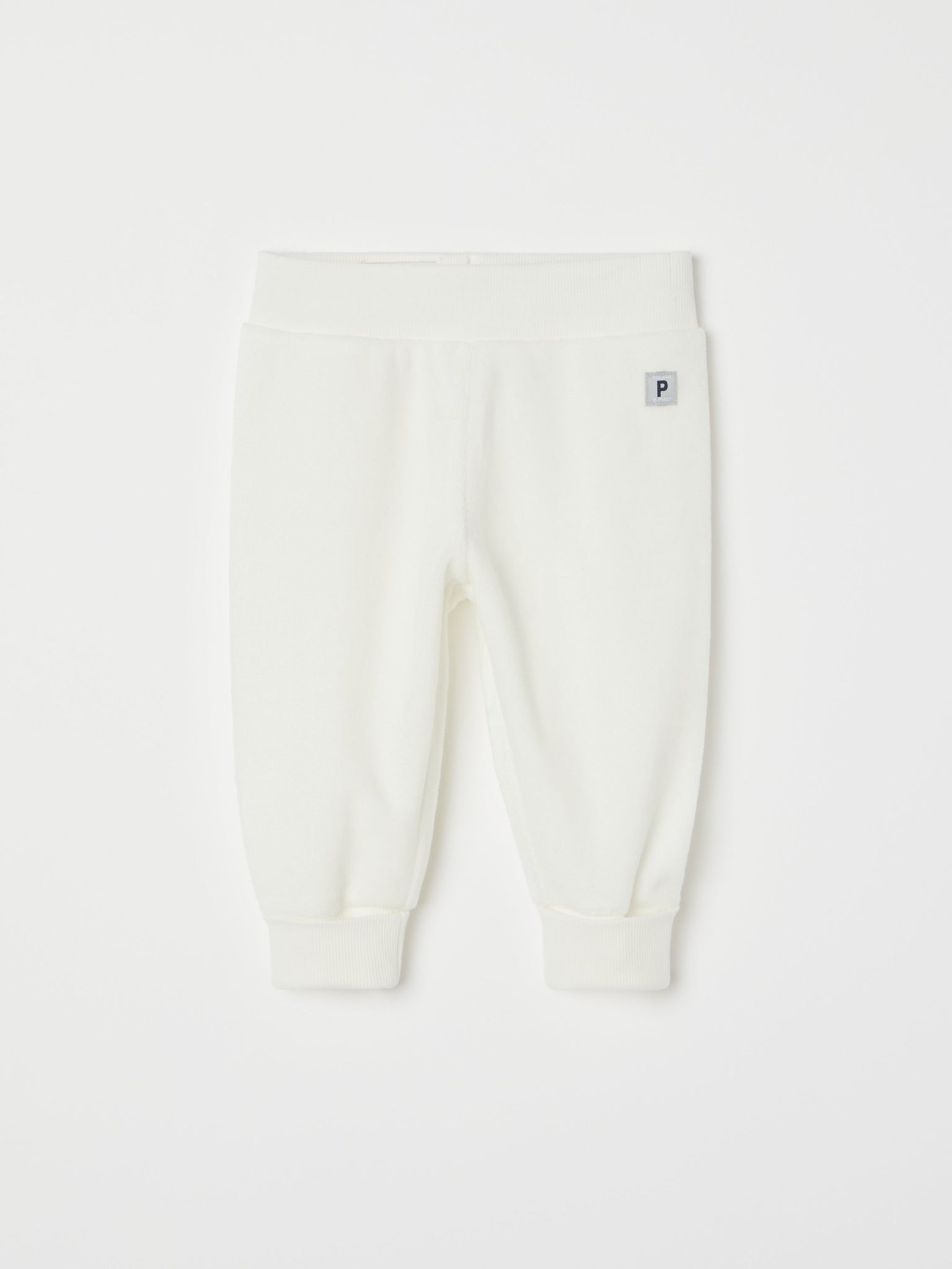 White Velour Baby Trousers from the Polarn O. Pyret baby collection. Nordic kids clothes made from sustainable sources.