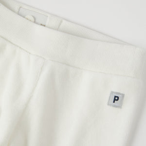 White Velour Baby Trousers from the Polarn O. Pyret baby collection. Nordic kids clothes made from sustainable sources.