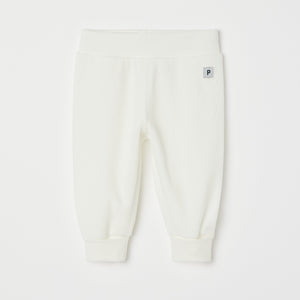 White Velour Baby Trousers from the Polarn O. Pyret baby collection. Nordic kids clothes made from sustainable sources.