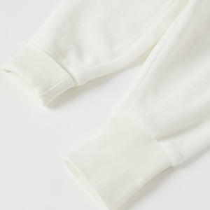 White Velour Baby Trousers from the Polarn O. Pyret baby collection. Nordic kids clothes made from sustainable sources.