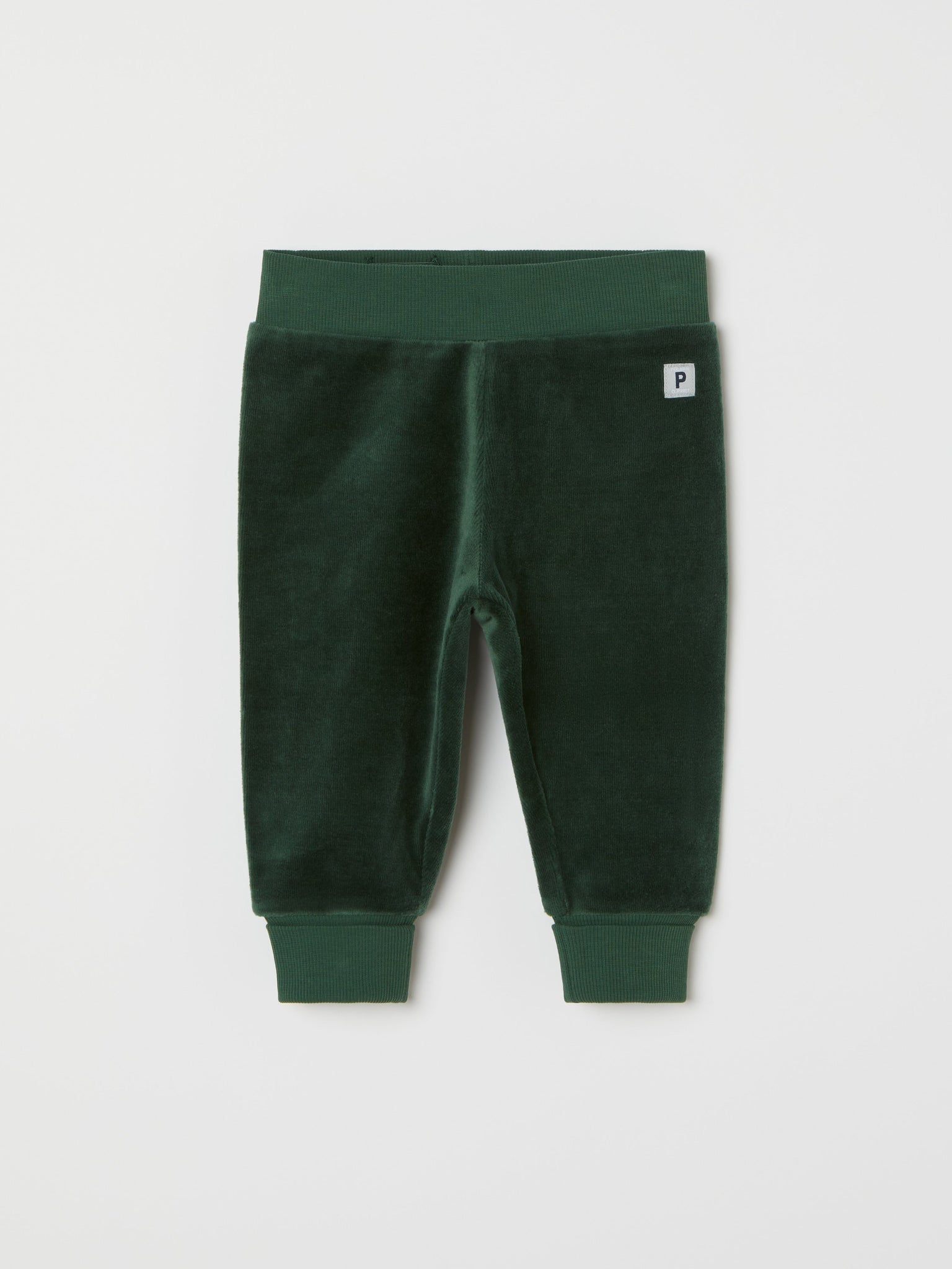 Green Velour Baby Trousers from the Polarn O. Pyret baby collection. Clothes made using sustainably sourced materials.