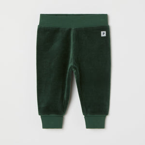 Green Velour Baby Trousers from the Polarn O. Pyret baby collection. Clothes made using sustainably sourced materials.