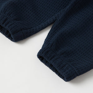 Waffle Texture  Cotton Baby Trousers from the Polarn O. Pyret baby collection. Ethically produced kids clothing.