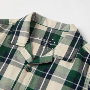 Checked Kids Pyjamas from the Polarn O. Pyret kidswear collection. Nordic kids clothes made from sustainable sources.