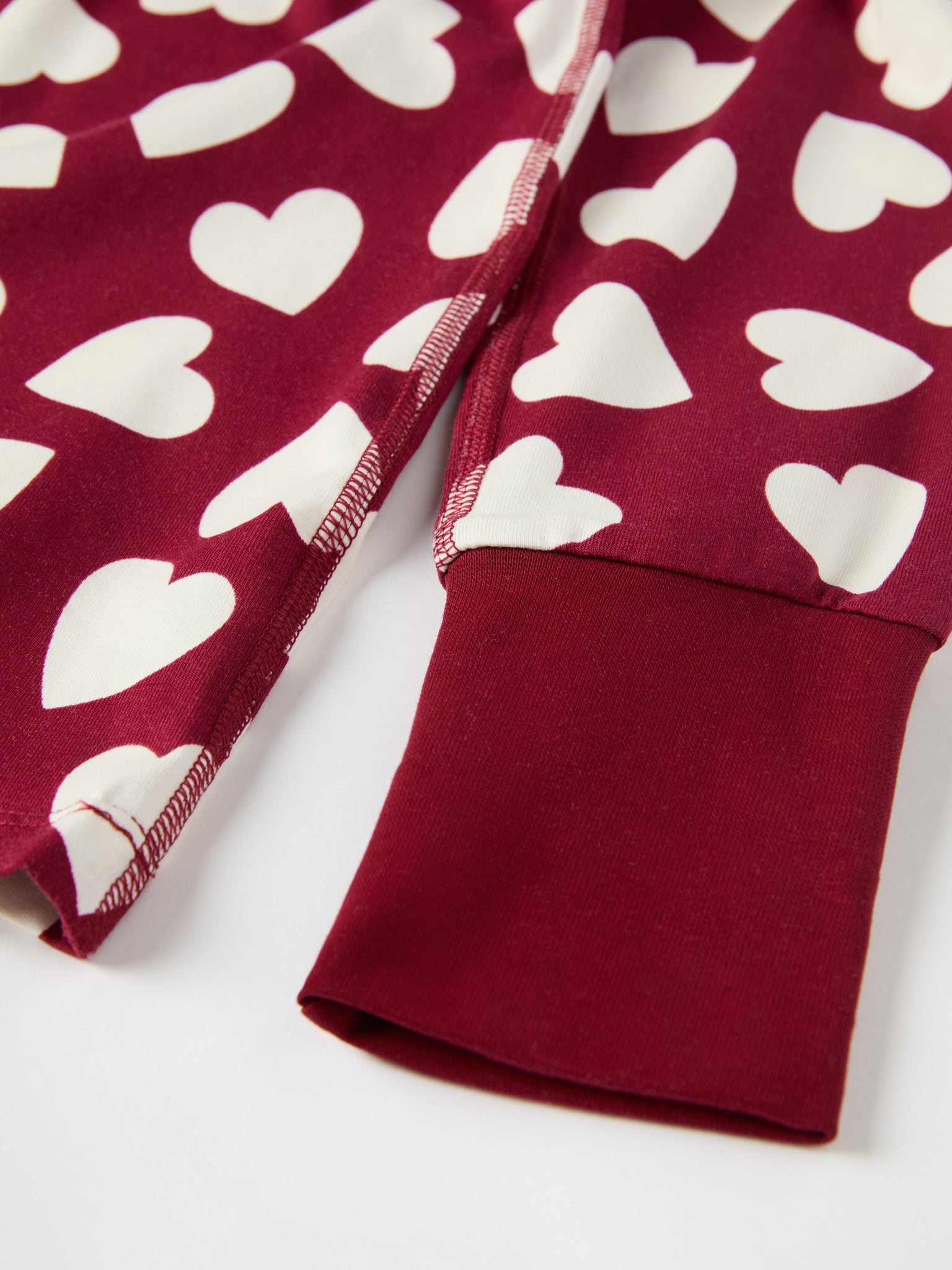 Heart Print Kids Pyjamas from the Polarn O. Pyret kidswear collection. Nordic kids clothes made from sustainable sources.