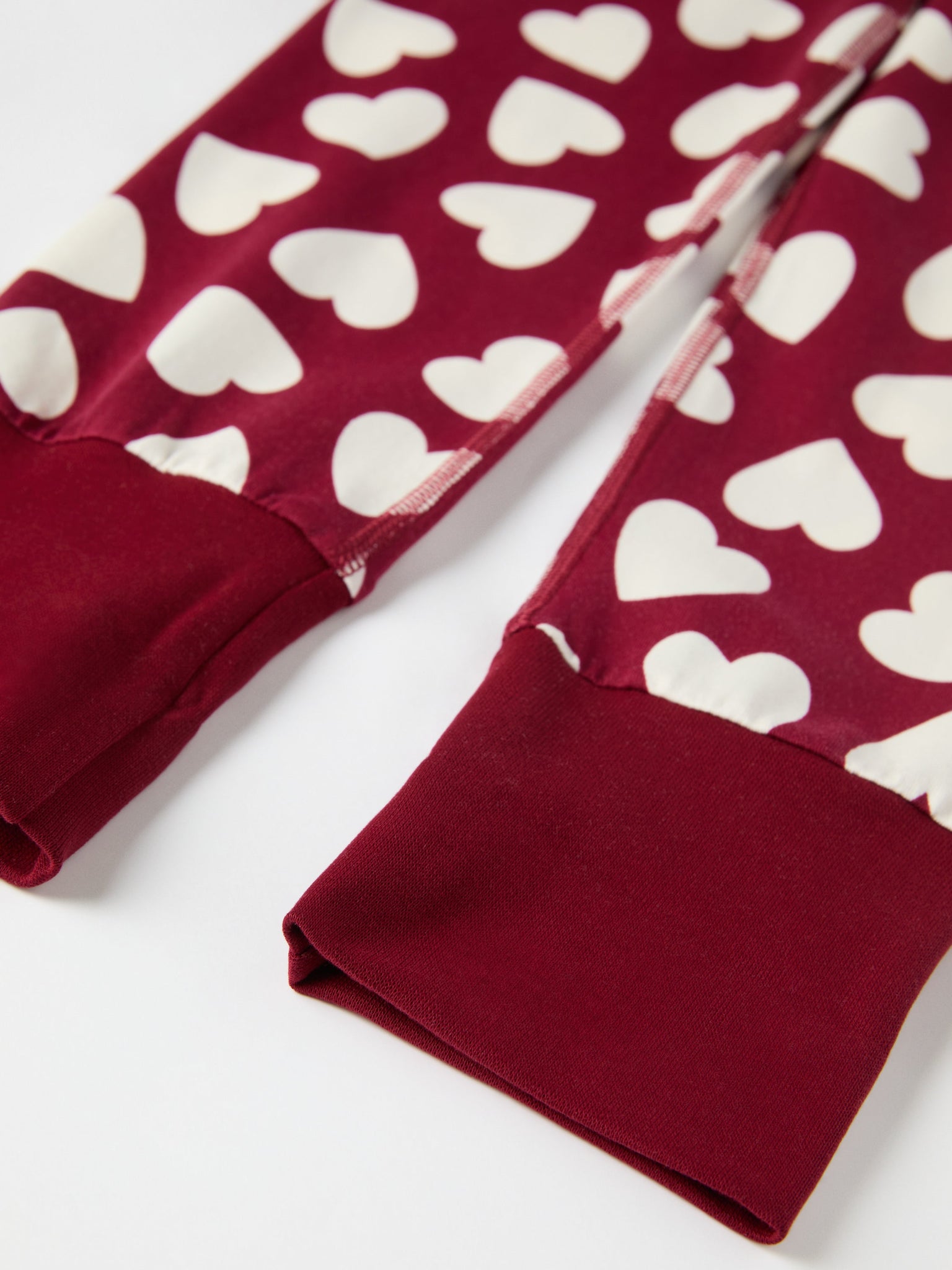 Heart Print Kids Pyjamas from the Polarn O. Pyret kidswear collection. Nordic kids clothes made from sustainable sources.