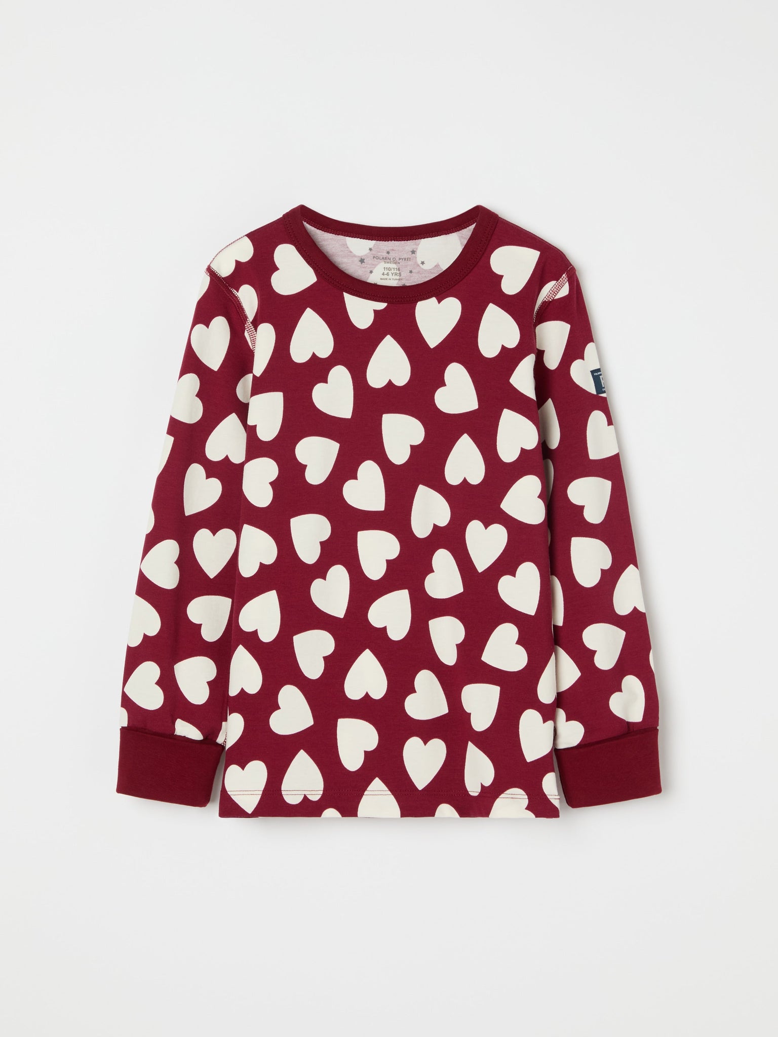 Heart Print Kids Pyjamas from the Polarn O. Pyret kidswear collection. Nordic kids clothes made from sustainable sources.