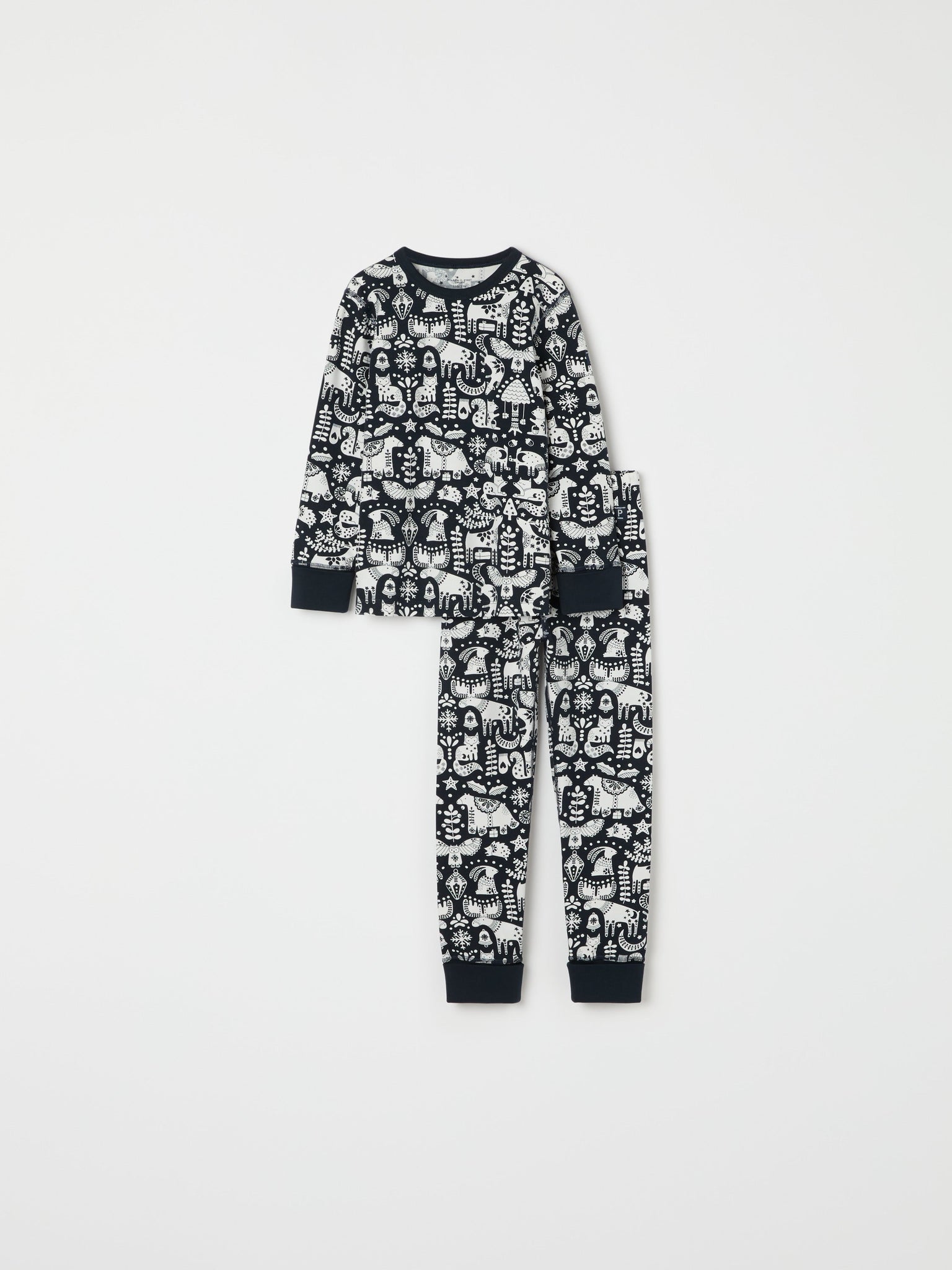 Nordic Christmas Print Kids Pyjamas from the Polarn O. Pyret kidswear collection. Ethically produced kids clothing.