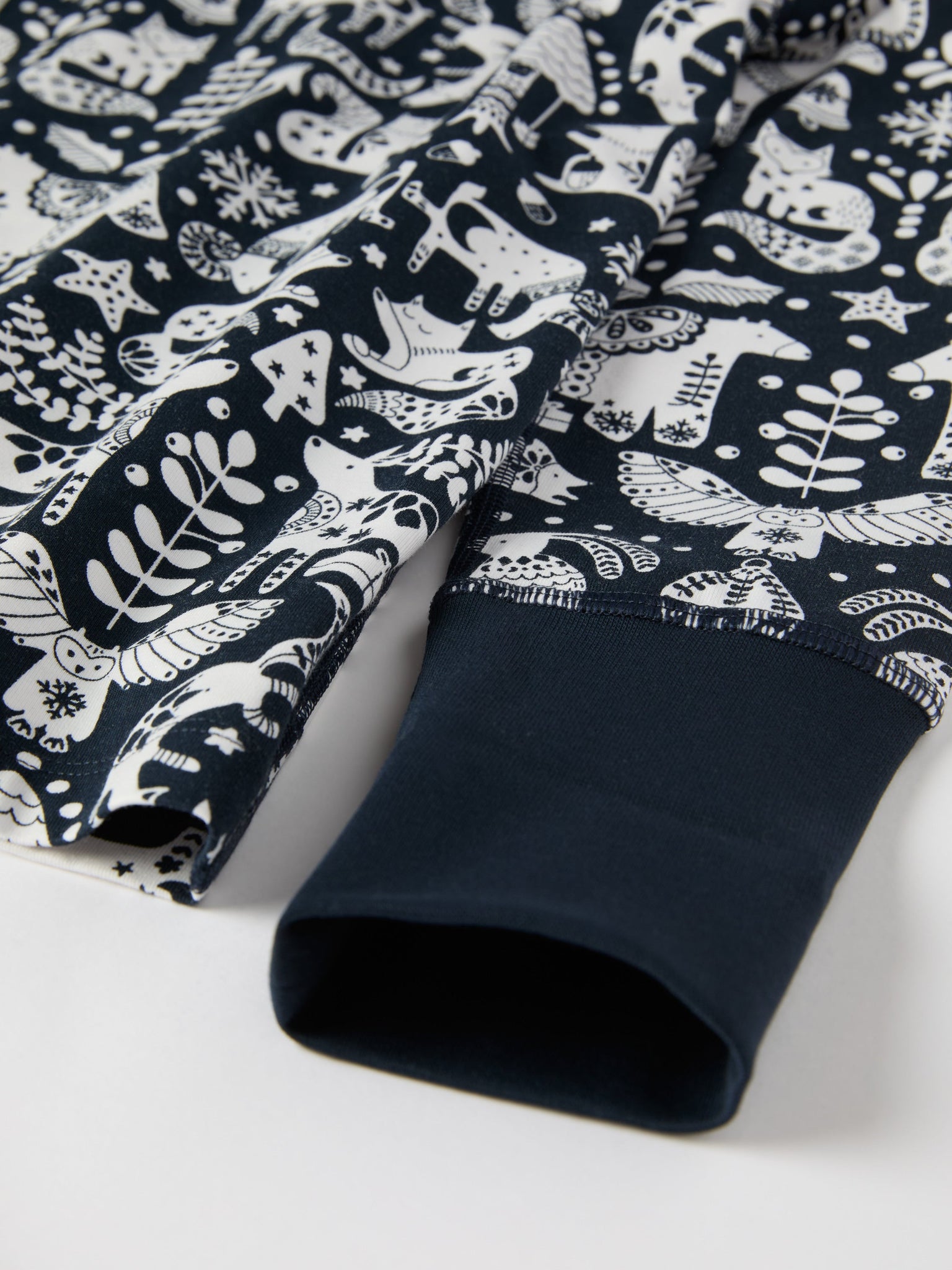 Nordic Christmas Print Kids Pyjamas from the Polarn O. Pyret kidswear collection. Ethically produced kids clothing.