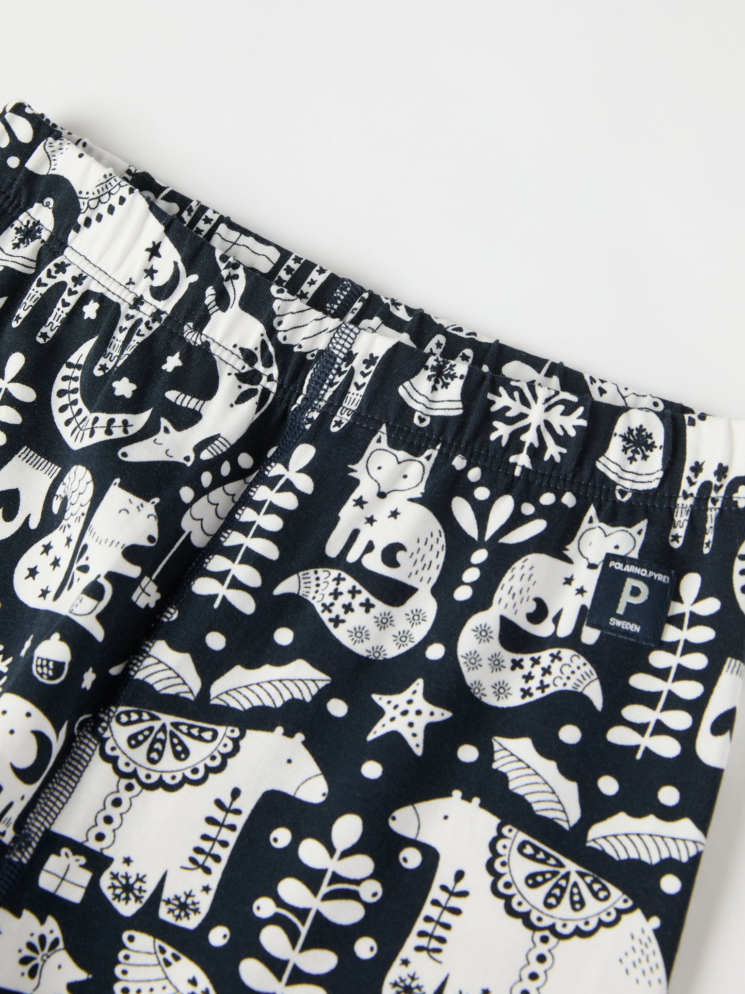 Nordic Christmas Print Kids Pyjamas from the Polarn O. Pyret kidswear collection. Ethically produced kids clothing.