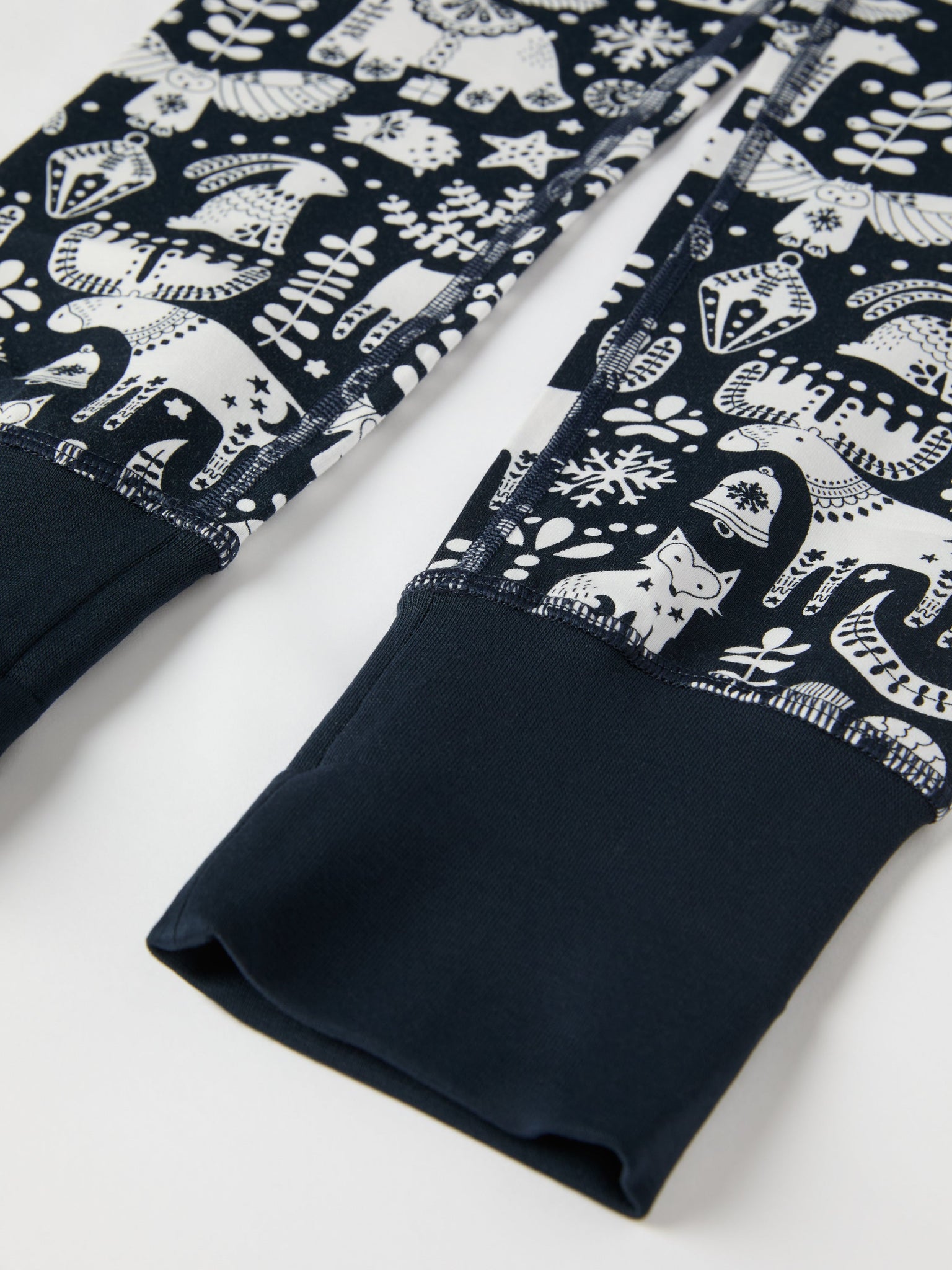 Nordic Christmas Print Kids Pyjamas from the Polarn O. Pyret kidswear collection. Ethically produced kids clothing.