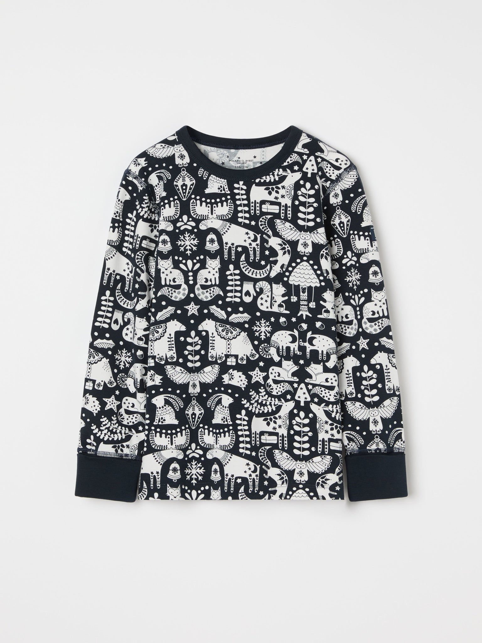 Nordic Christmas Print Kids Pyjamas from the Polarn O. Pyret kidswear collection. Ethically produced kids clothing.