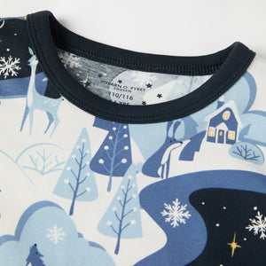 Winter Forest Print Kids Pyjamas from the Polarn O. Pyret kidswear collection. Clothes made using sustainably sourced materials.