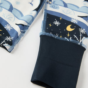 Winter Forest Print Kids Pyjamas from the Polarn O. Pyret kidswear collection. Clothes made using sustainably sourced materials.