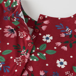 Festive Floral Print Kids Dress from the Polarn O. Pyret kidswear collection. Nordic kids clothes made from sustainable sources.