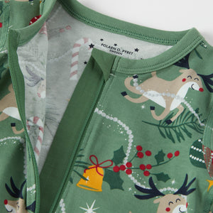 Reindeer Print Baby Sleepsuit from the Polarn O. Pyret baby collection. Nordic kids clothes made from sustainable sources.