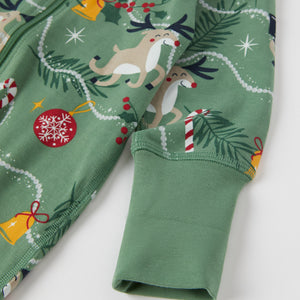 Reindeer Print Baby Sleepsuit from the Polarn O. Pyret baby collection. Nordic kids clothes made from sustainable sources.