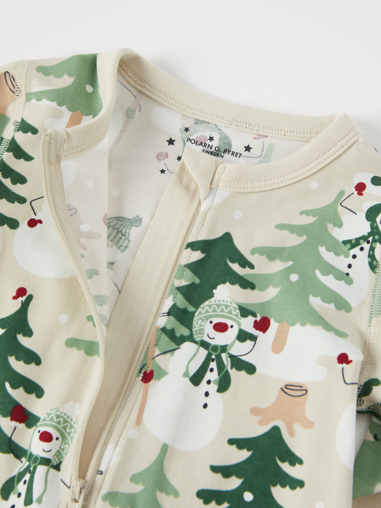 Nordic Forest Print Baby Sleepsuit from the Polarn O. Pyret baby collection. Clothes made using sustainably sourced materials.