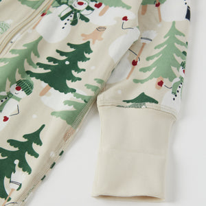 Nordic Forest Print Baby Sleepsuit from the Polarn O. Pyret baby collection. Clothes made using sustainably sourced materials.