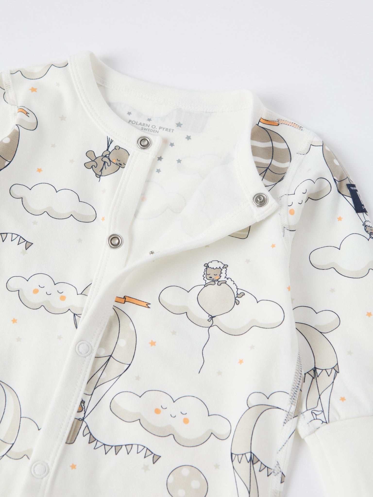 Balloon Print Baby Sleepsuit from the Polarn O. Pyret baby collection. Clothes made using sustainably sourced materials.