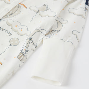 Balloon Print Baby Sleepsuit from the Polarn O. Pyret baby collection. Clothes made using sustainably sourced materials.