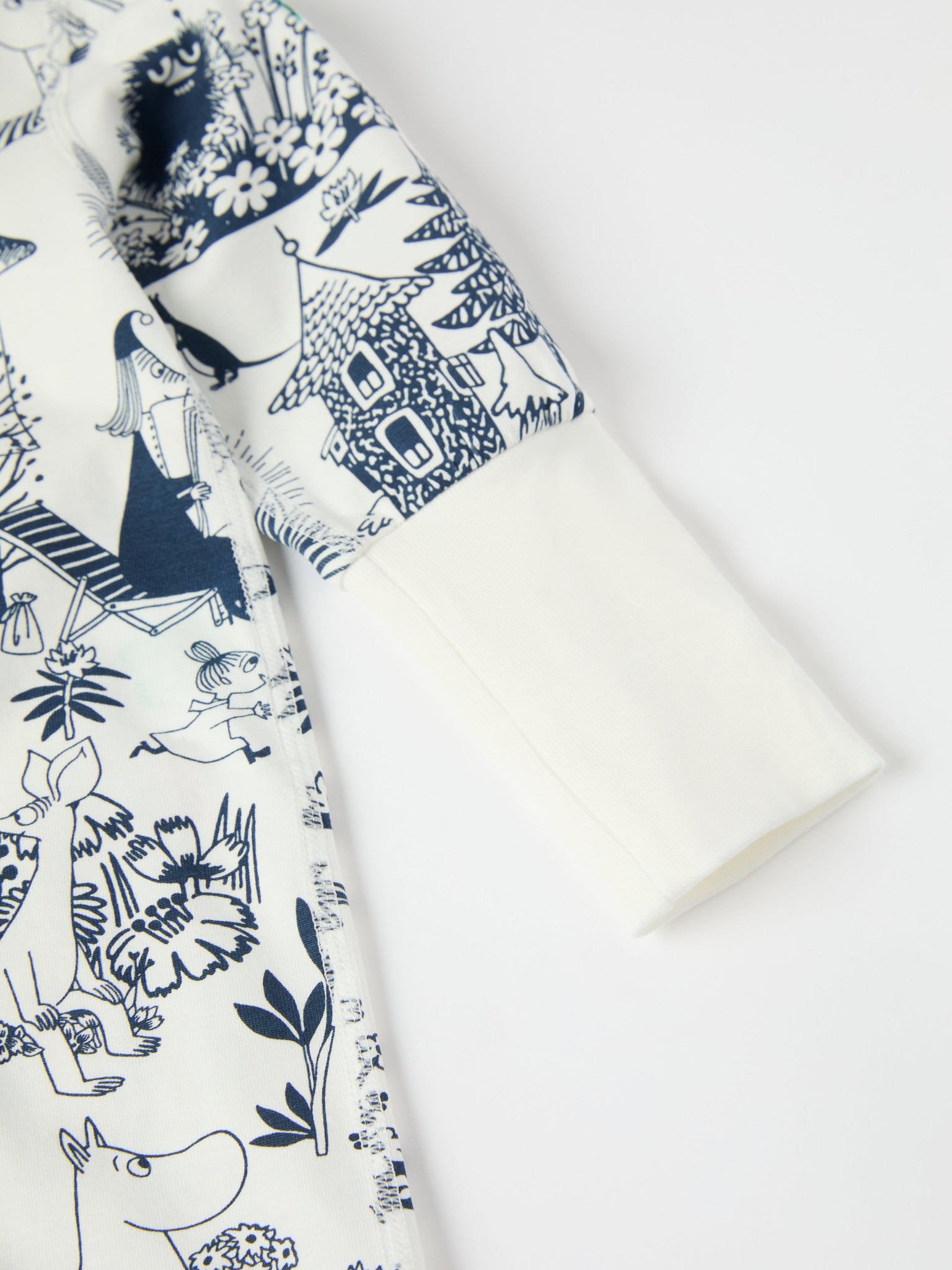 Moomin Print Cotton Baby Sleepsuit from the Polarn O. Pyret baby collection. Clothes made using sustainably sourced materials.