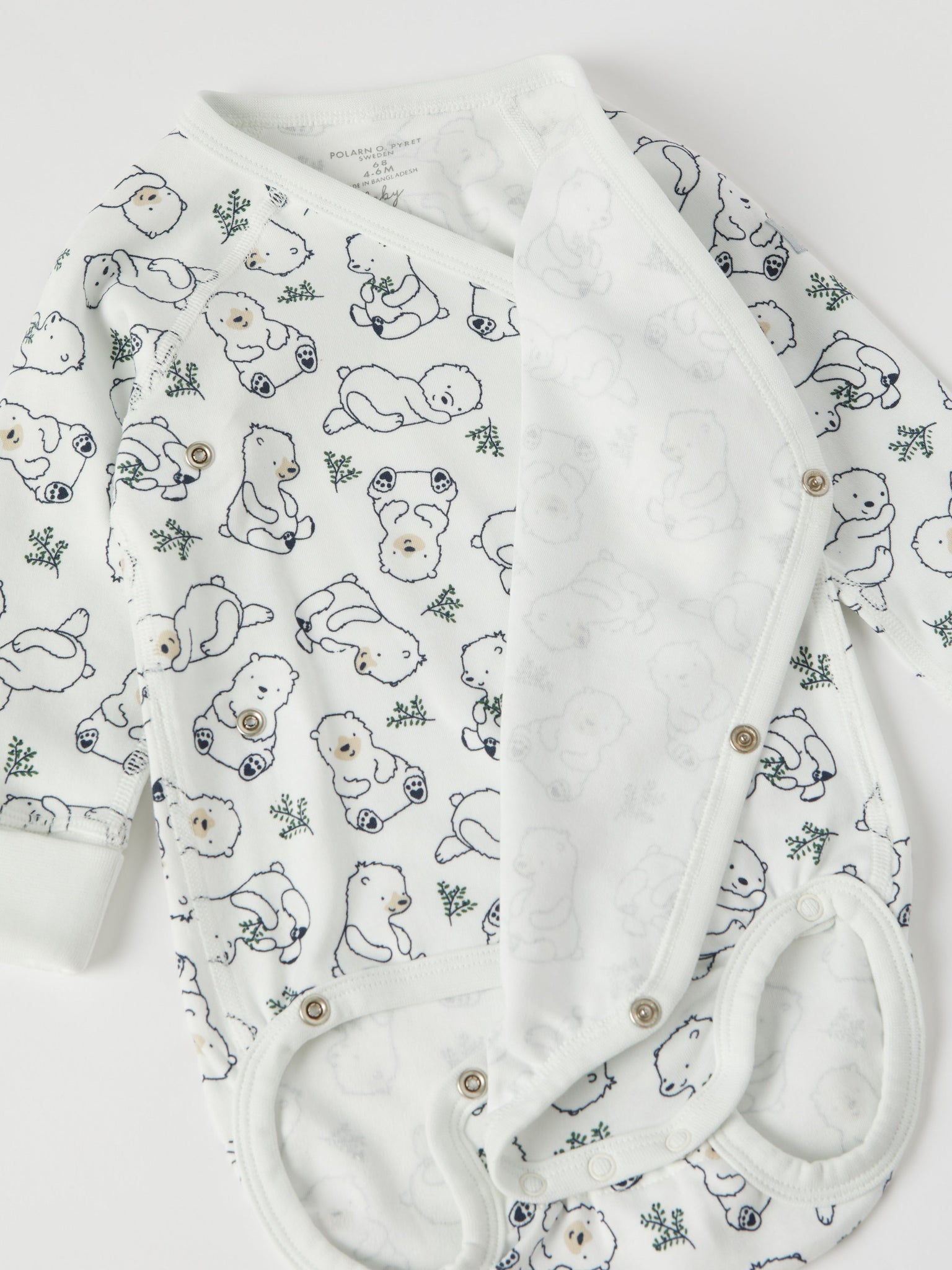 Bear Print Wraparound Babygrow from the Polarn O. Pyret baby collection. Clothes made using sustainably sourced materials.