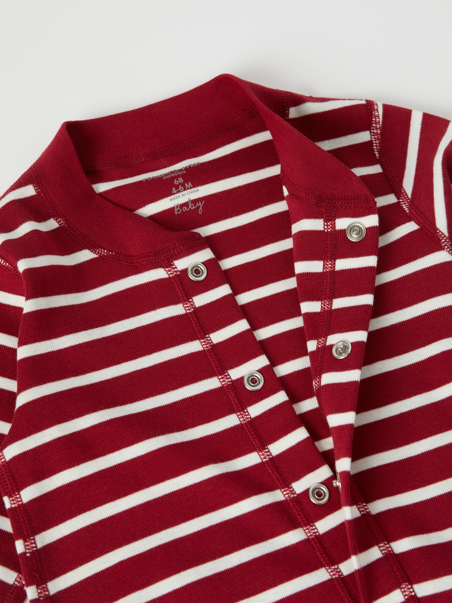 Red Striped Baby Sleepsuit from the Polarn O. Pyret baby collection. Ethically produced kids clothing.