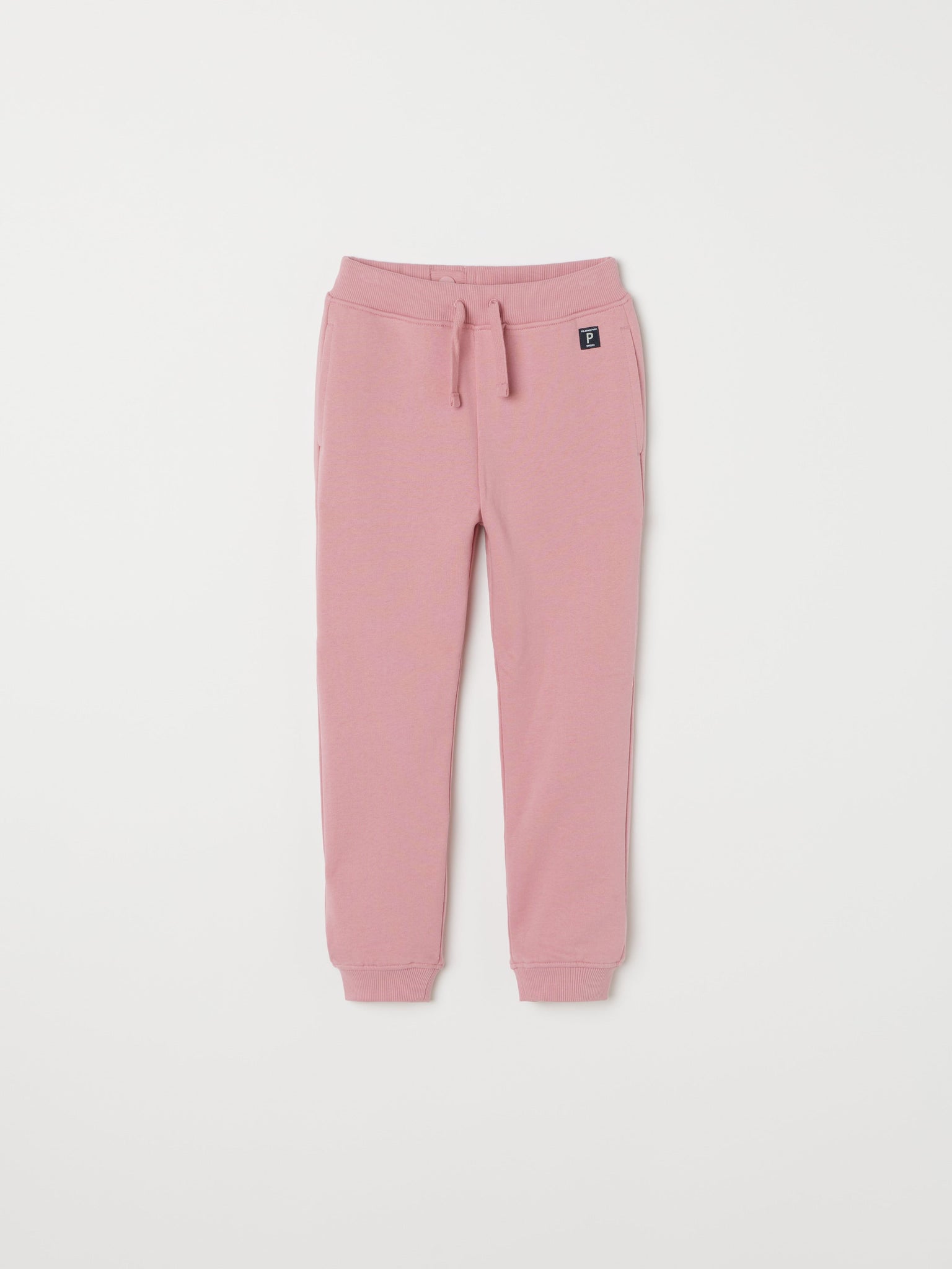 Pink Kids Joggers from Polarn O. Pyret kidswear. Clothes made using sustainably sourced materials.